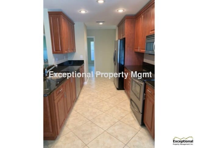 Building Photo - Beautiful 3 bedroom 2 bath Gulf Access Pool home SW Cape Lawn and Pool Svc Included