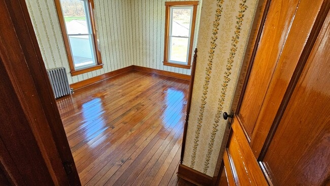 Building Photo - Country Living in This 4 Bedroom Farmhouse!