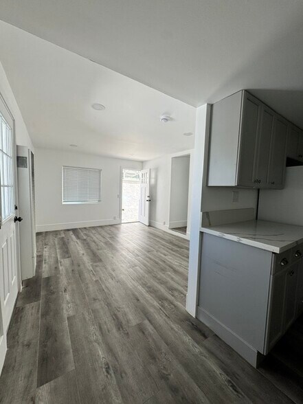 View from Kitchen Into Living Room and Front Door - 621 Manhattan Avenue