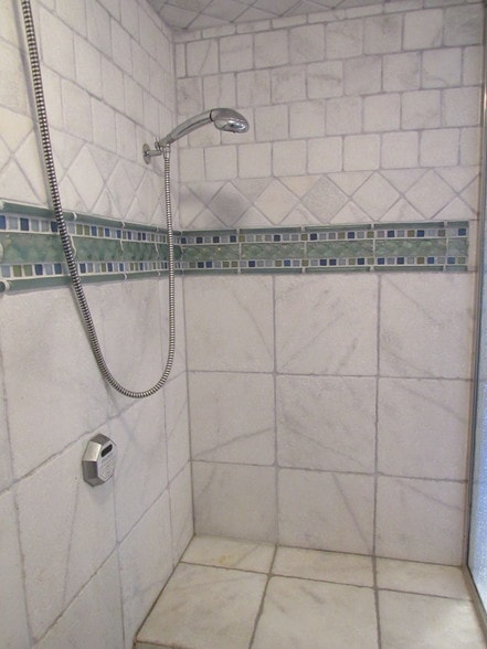 Second shower head and steam controller - 100 Marina Dr
