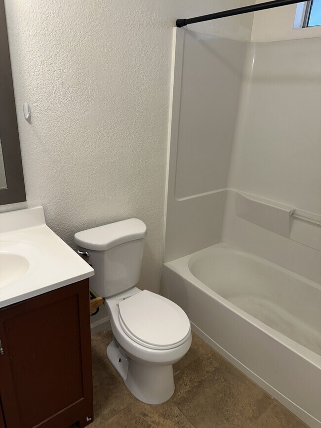 Building Photo - Riverbank 3 Bedroom 2 Bath Fourplex with Garage