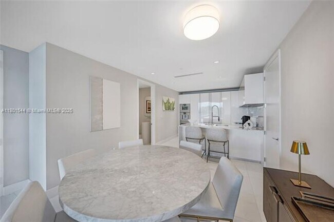 Building Photo - 10201 Collins Ave
