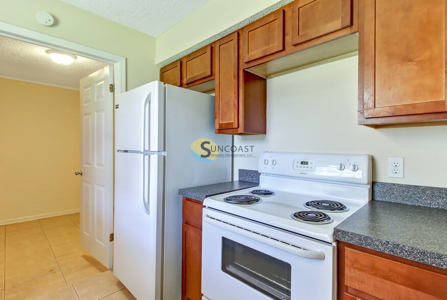 Building Photo - 7438 Jade Dr N