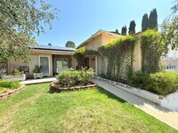 Building Photo - Spacious 4-Bedroom Home in Prime Santa Cla...