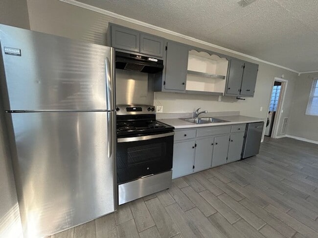 Building Photo - Call Property Manager Tonia Rollins at (50...