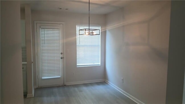 Building Photo - 5677 Wind Gate Ln