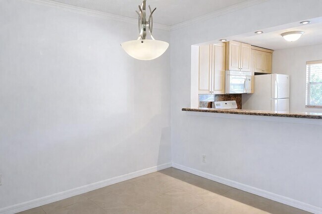 Building Photo - 608 SW Natura Blvd