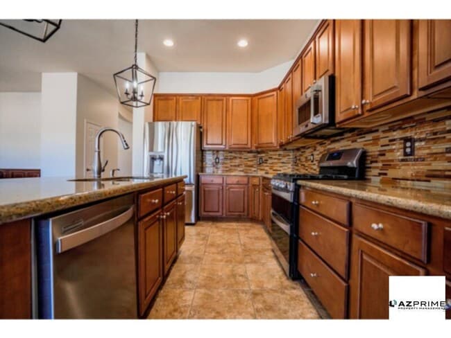 Building Photo - Resort-Style Living in Estrella Mountain Ranch - Private Pool, Solar &amp; Privacy