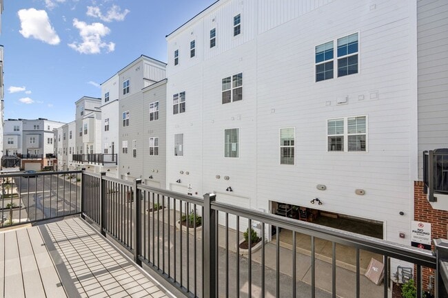 Building Photo - Brand New 4 Bedroom, 3.5 Bath Townhome in ...