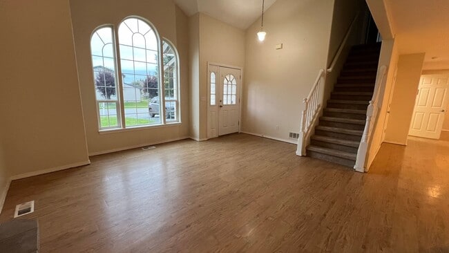 Building Photo - A spacious (4) Bedroom, (2.5) Bathroom hom...