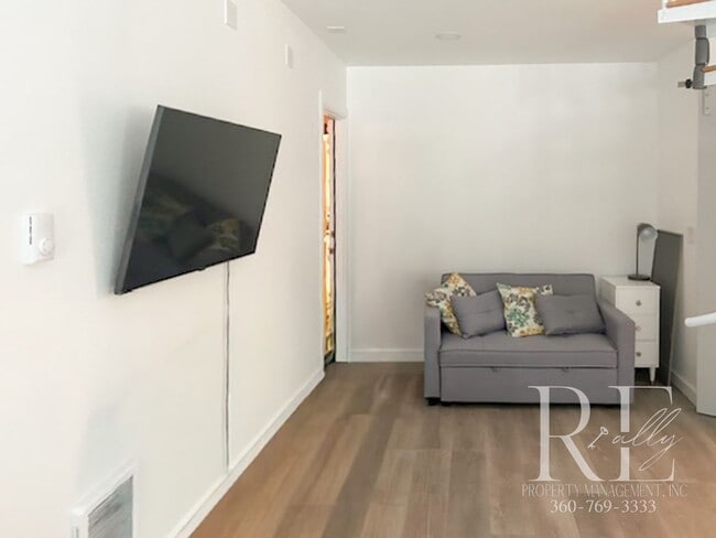 Building Photo - Charming Tudor Loft with Spiral Staircase & Waterfront Access