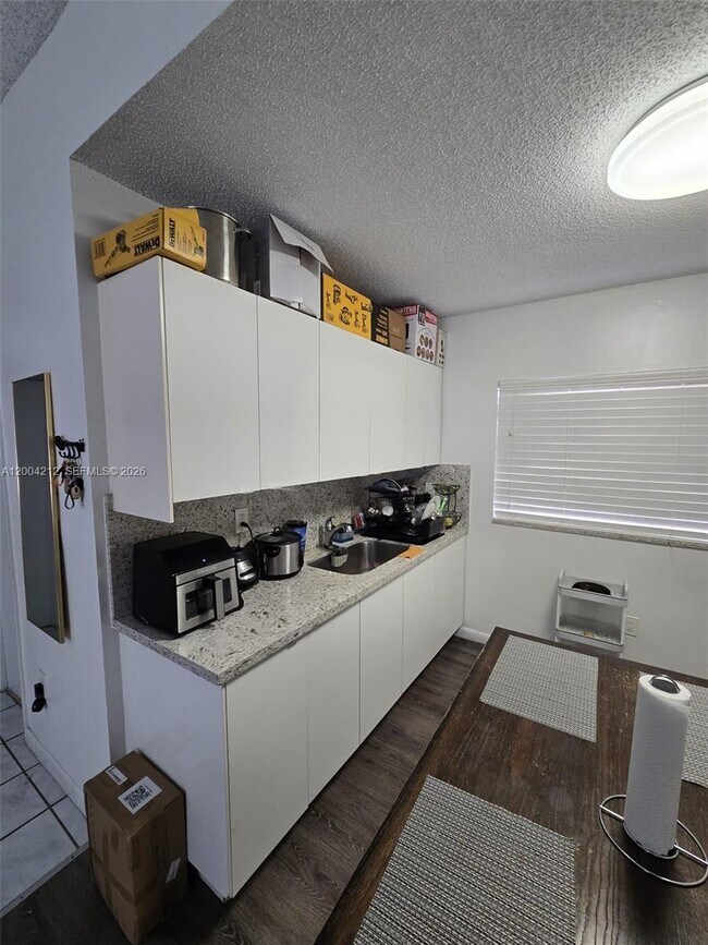 Building Photo - 6370 W 27th Ct