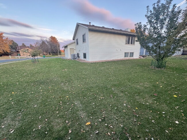 Building Photo - "Charming 4-Bedroom Home with Granite Elegance & Hardwood Warmth in Savage!"