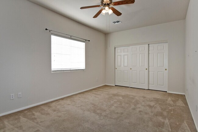 Building Photo - THIS 2 STORY HOME IN A GATED COMMUNITY HAS...