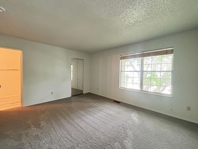 Building Photo - Large 2-story townhome with finished basement & 1-car garage!