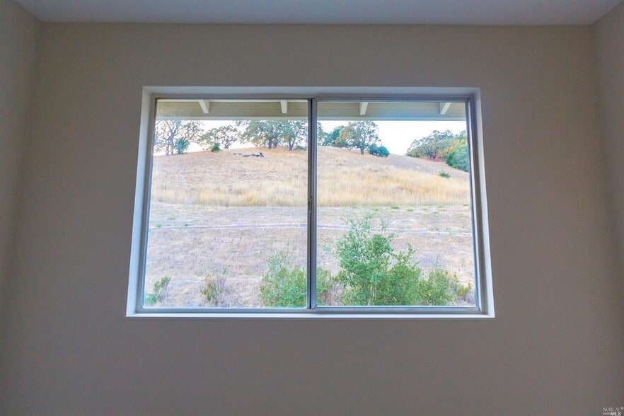 View of hill from LR - 13B Oliva Dr