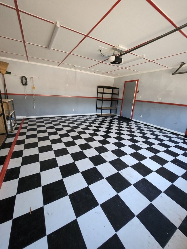 Building Photo - Available Now, PG 4 Bedroom