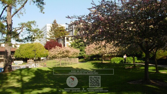 Building Photo - Beautiful sunny top floor condo, includes ...
