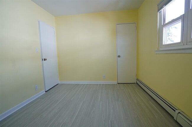 Building Photo - 203-12 42nd Ave
