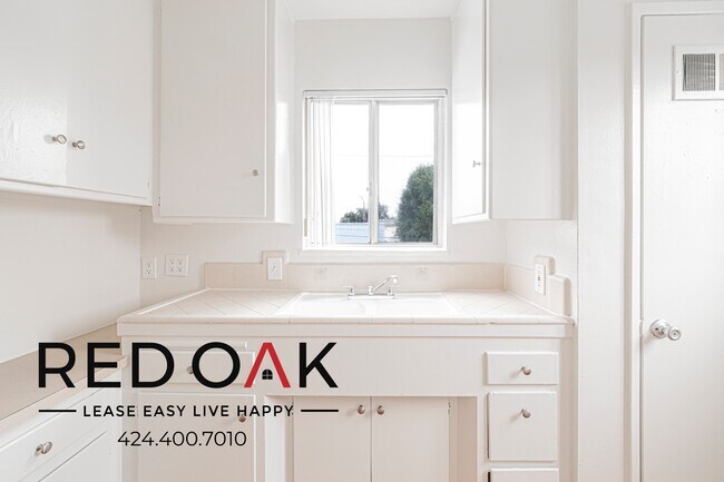 Building Photo - 6803 Long Beach Blvd