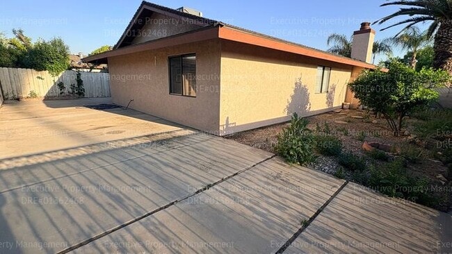 Building Photo - 3 bedroom 2 bathroom home on a corner lot with extra fenced parking.