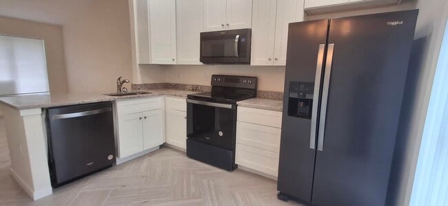 Building Photo - Exceptional Fully Remodeled 2-Bedroom, 2-Bath Duplex in University PlaceFenced Yard