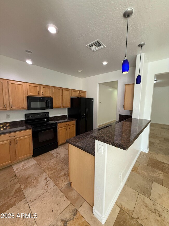 Building Photo - 7024 W Alta Vista Rd