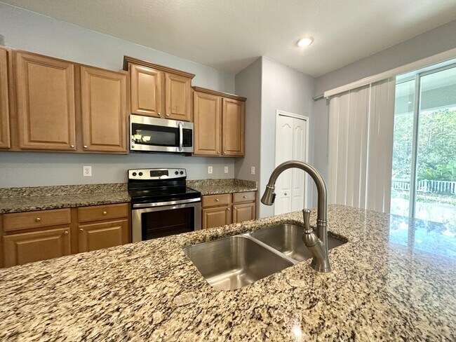 Building Photo - "Spacious 5-Bedroom Retreat with Scenic Views in The Verandahs!"