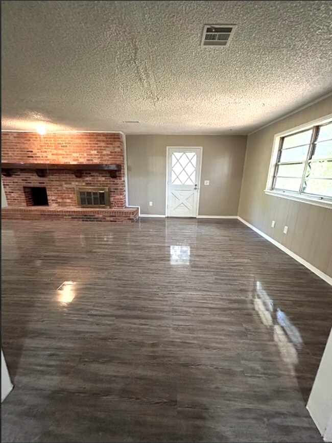 Building Photo - Spacious 5-Bedroom Home with Modern Updates and a Cozy Fireplace