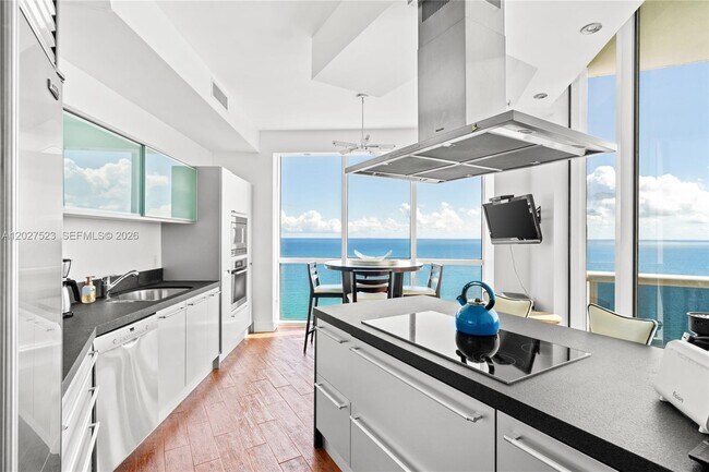 Building Photo - 18201 Collins Ave
