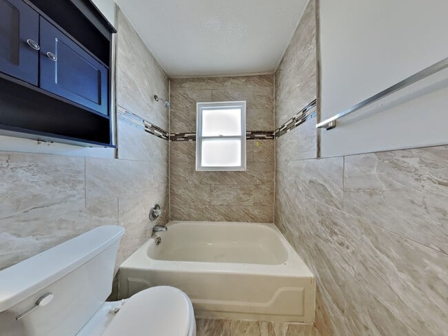 Building Photo - Newly Renovated Single Family Home | 4 BR/1.5BA | Garage Parking