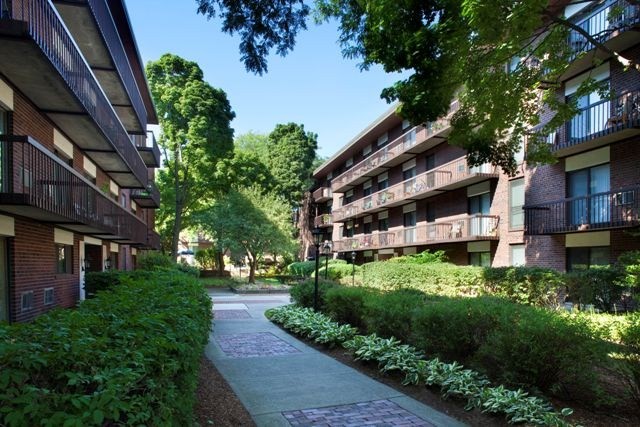 Quincy Commons has Plush Landscaping Throughout! - Quincy Commons