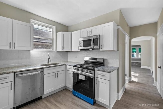 Building Photo - 7815 S Langley Ave