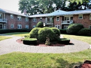 Building Photo - 9/11/13 Village Dr.