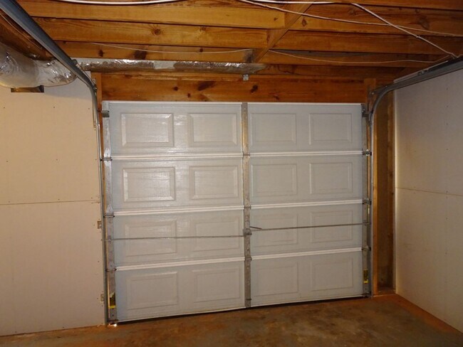 Building Photo - Great location, large wooded and fenced ya...