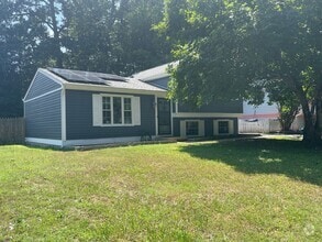 Building Photo - Updated Tri-Level home with solar panels!