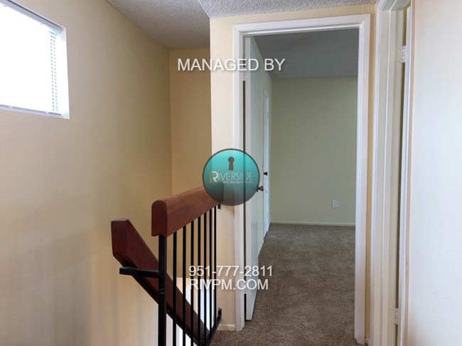 Building Photo - DISCOVER YOUR DREAM CONDO IN COLTON!!!