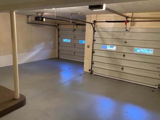 2 Private Garage Doors - Juno Place Townhomes