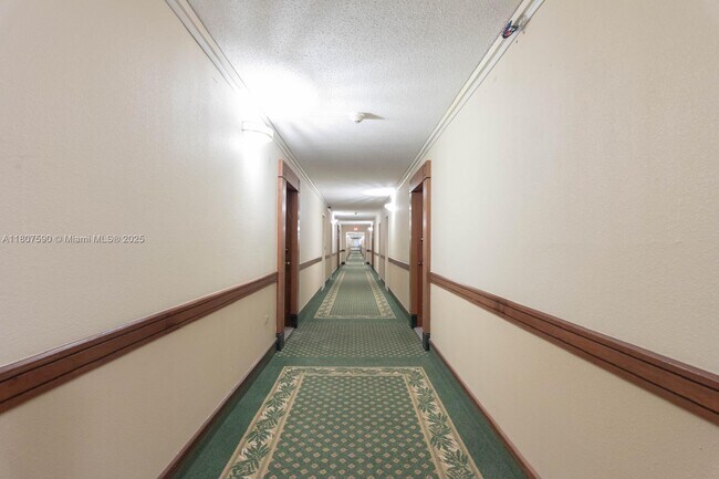 Building Photo - 5555 Collins Ave