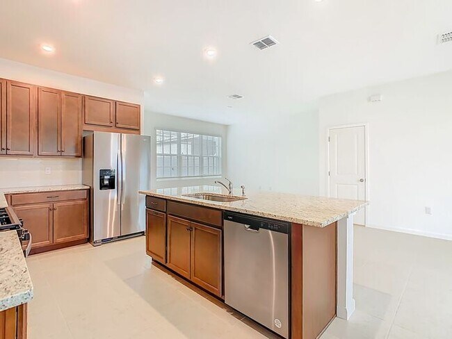 Building Photo - New Luxury Townhome in Celebration, FL Corner unit. All porcelain tiled floors. Aleutian model by...