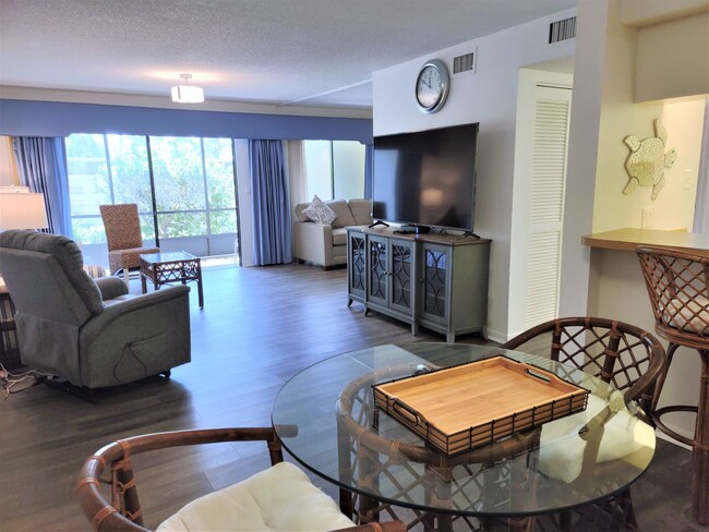 Building Photo - Bird Bay Village Annual Rental – Furnished 1st Floor Unit with Covered Parking