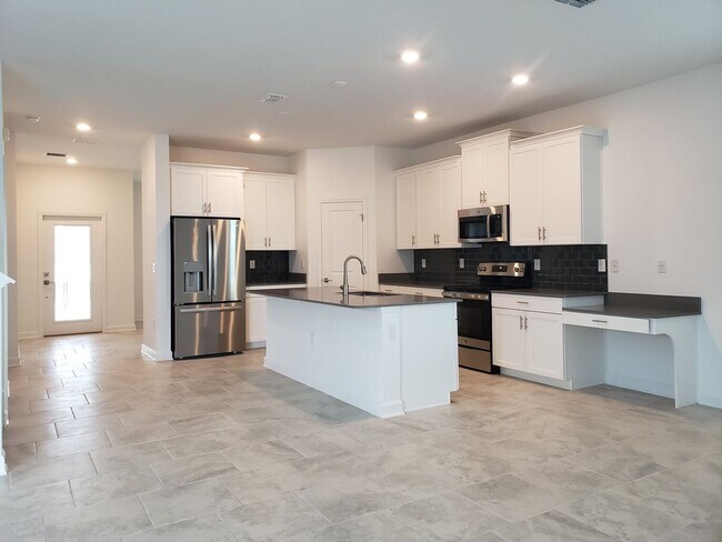 Building Photo - Bridgewalk Corner Lot Home with Wooded View and Solar Panels