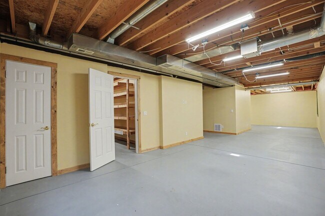 Building Photo - Backs to Open Space | Over 4,000 Sq Ft | Updated Kitchen + Solar