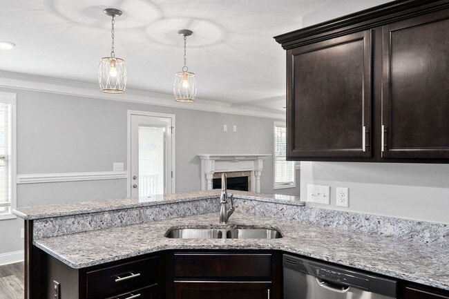 Building Photo - Pet Friendly Three Bedroom with Bonus!