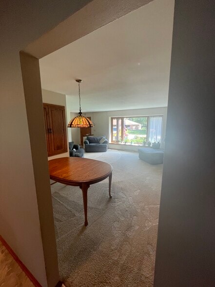 Formal dining area and living room - 9640 W Barnard Ave
