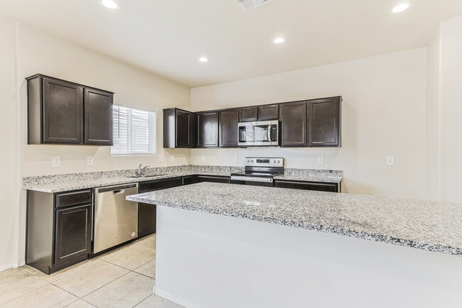 Building Photo - Bright Coolidge 4-Bedroom Home