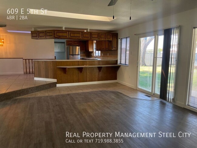 Building Photo - Step into Timeless Elegance: A 4-Bedroom, ...