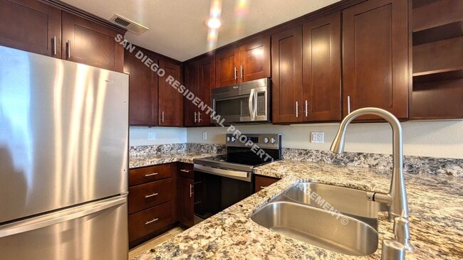Building Photo - Desirable North Park Condo with Amazing Vi...