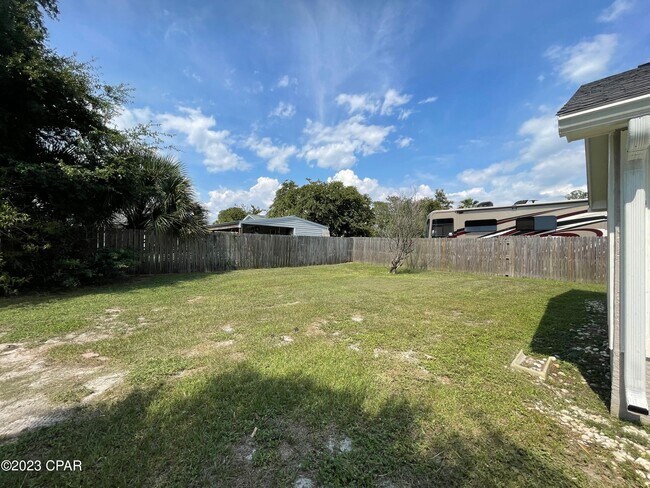 Building Photo - 122 Treasure Palm Dr