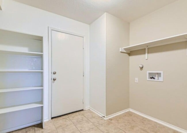 Building Photo - 5127 Mustang Cove